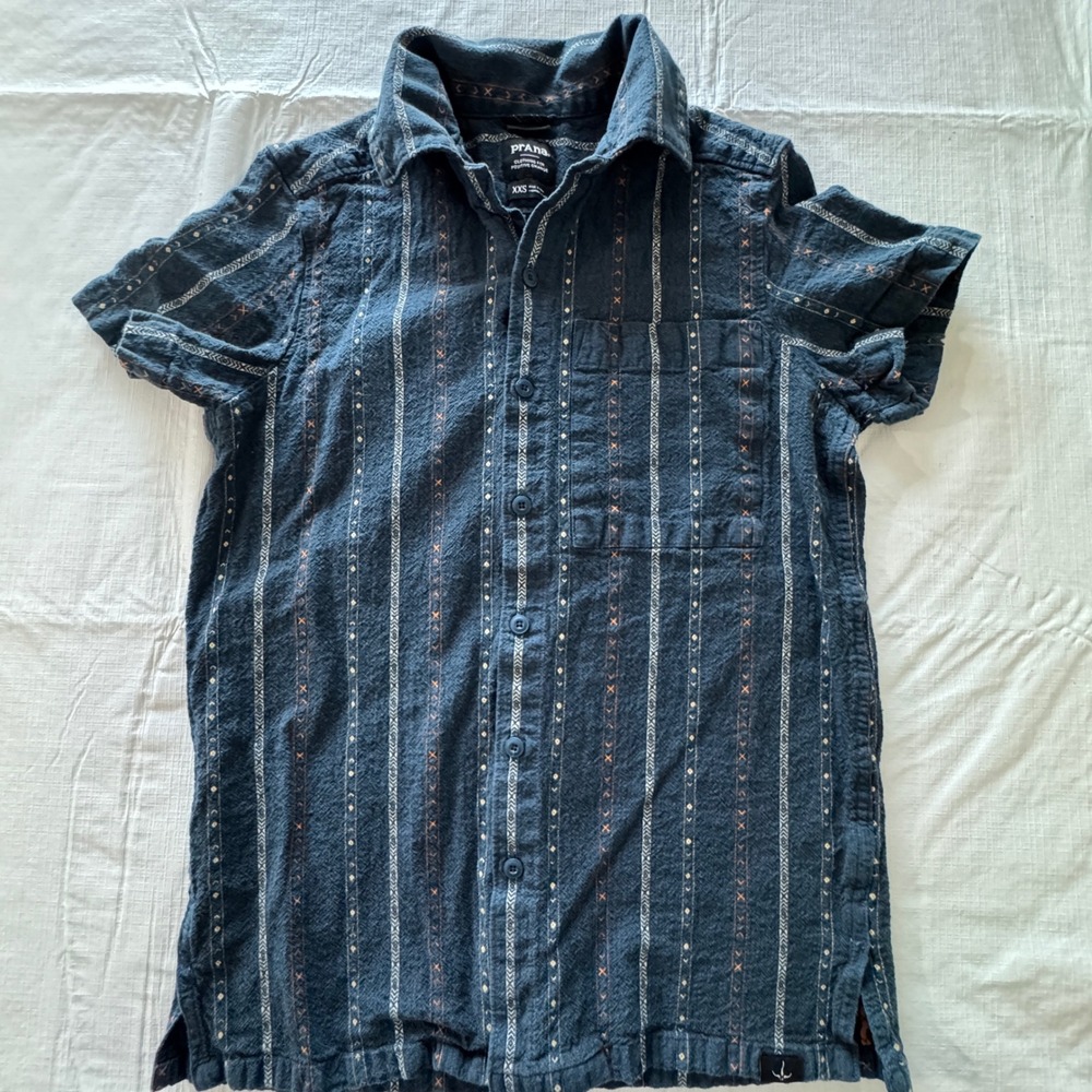 Prana Men's Short Sleeve Button-Down Shirt in Dark Blue with Subtle Rust Accents